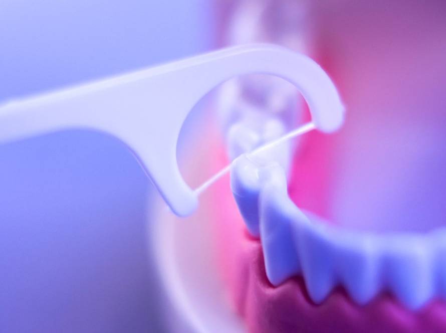 How to Floss Back Teeth